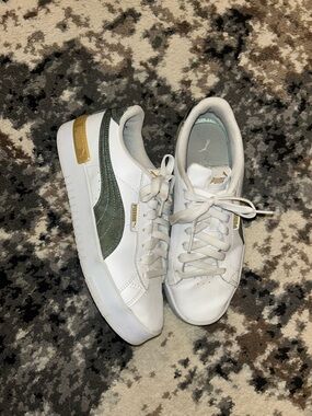 Puma Women’s White Leather Sneakers with Green Stripe and Gold Accents